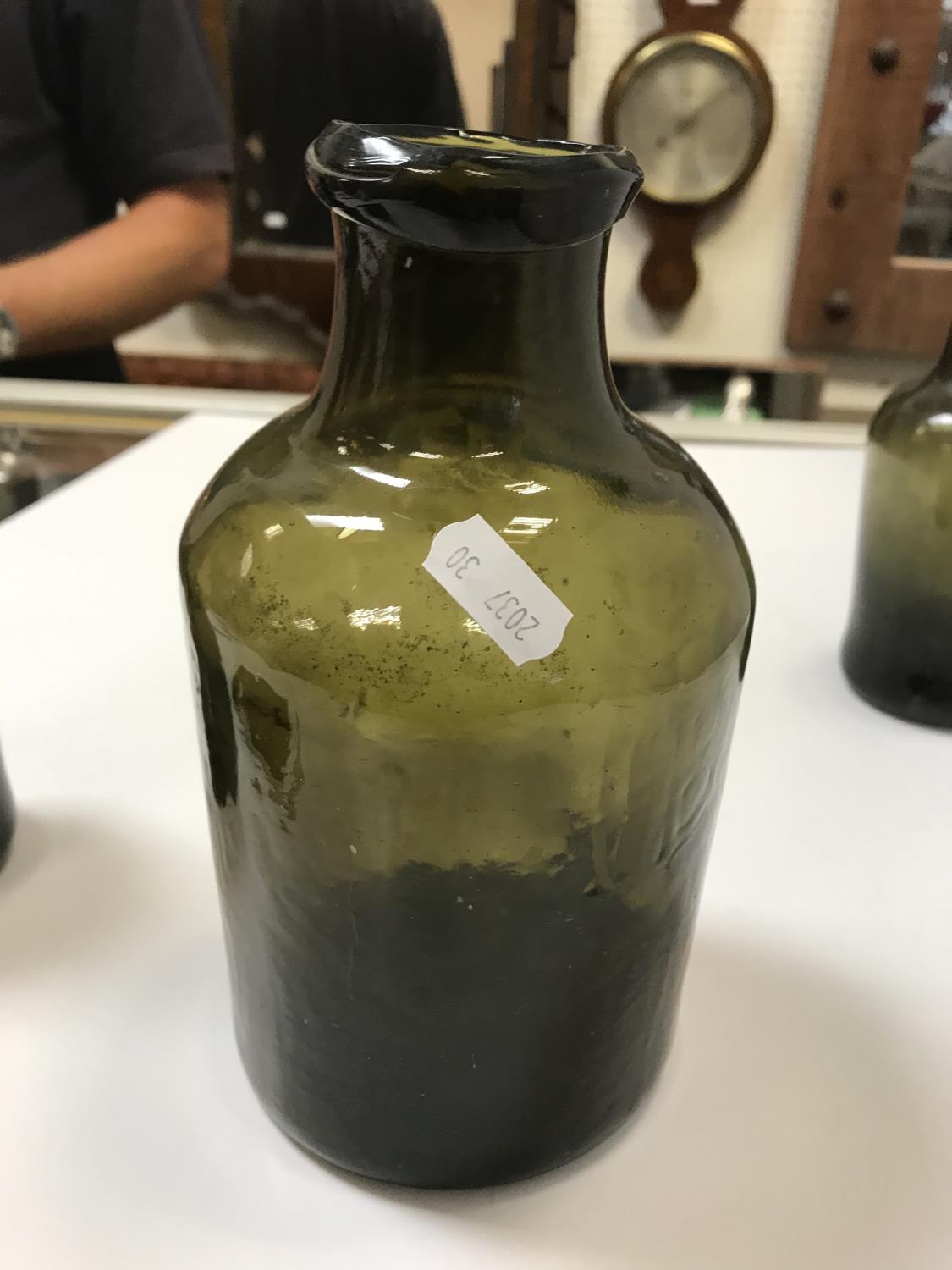 A selection of three 19th Century green glass bottles, the tallest approx 21. - Image 12 of 22