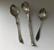 A silver preserve spoon in the Arts & Crafts manner (by William Henry Warmington, London 1959),