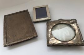 Two silver photo frames and a plated photo frame, the plain rectangular frame, 19.