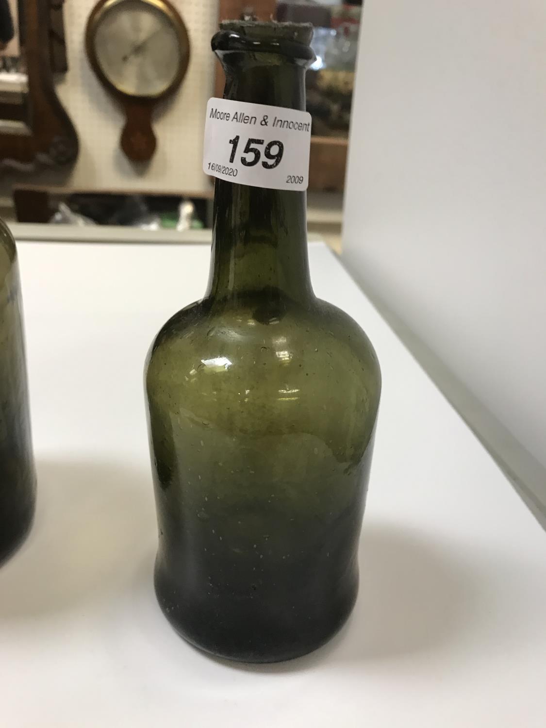 A selection of three 19th Century green glass bottles, the tallest approx 21. - Image 2 of 22