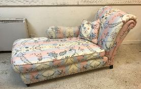 A modern upholstered chaise longue in the Victorian style,