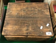 A wooden case containing a set of eight wooden lawn bowls with china Jaques of London jack
