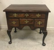 A mid 18th Century walnut lowboy,