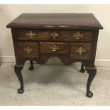 A mid 18th Century walnut lowboy,