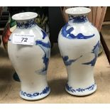 A pair of 19th Century Chinese baluster shaped vases decorated with warriors on horseback,