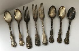 A set of three Shell and Fiddle pattern silver table forks (by William Eaton, London 1835),