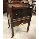 A George III mahogany tray top night table with tambour front compartment over a single drawer,