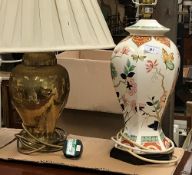 A pair of brassed standard lamps,