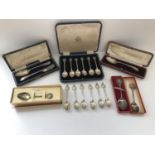 A collection of silver commemorative spoons to include a cased set of Silver Jubilee spoons with