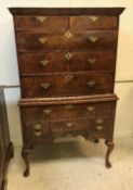 An early 18th Century walnut chest on stand,