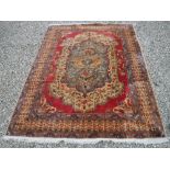 A modern machine woven Persian rug,