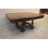 An early 20th Century French walnut rounded rectangular coffee table on four column supports united