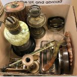 Two boxes of metalwares to include two oil lamps, a pair of three branch candelabras,