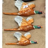 A set of three Beswick flying pheasant ornaments numbered 661/1 and 2 and 3 to back