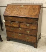 An early 18th Century walnut bureau,