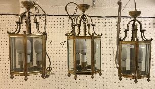 Three modern brass and glass octagonal hanging lanterns CONDITION REPORTS The approx