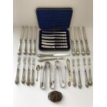 A collection of Georgian and Victorian silver sugar tongs, two pairs with bright cut decoration,