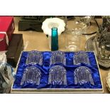 A collection of glassware to include a Dartington water jug, comport and candle holder,