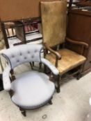 A Victorian buttoned upholstered shell back salon chair on cabriole front legs to scroll feet and