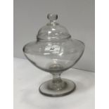 An early 19th Century leech jar on pedestal stand and circular foot with associated cover 23 cm