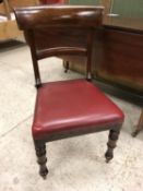 A set of eight Victorian mahogany bar back dining chairs with red wrexine upholstered seats on