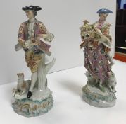 A pair of 19th Century Ludwigsburg porcelain figures as a lady and gentleman,