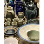 A collection of studio pottery to include Deborah Hopson-Wolpe bowls with inscribed rims,