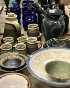 A collection of studio pottery to include Deborah Hopson-Wolpe bowls with inscribed rims,