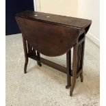 A 20th Century Georgian style mahogany drop leaf table,