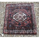 A Shiraz rug,