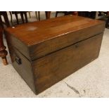 A circa 1900 teak trunk of plain form with iron carrying handles 80 cm wide x 45.
