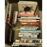 A box of various books, many illustrated by Ralph Steadman,