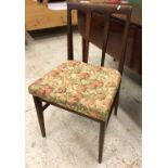 A set of four A E Younger Afromosia teak framed dining chairs,