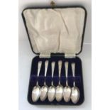 A set of six George III silver teaspoons with bright cut decoration (by Thomas Streetin,