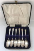 A set of six George III silver teaspoons with bright cut decoration (by Thomas Streetin,