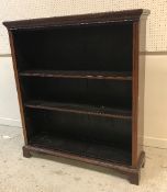 An Edwardian mahogany and satinwood strung open bookcase with adjustable shelving,