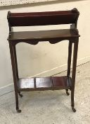 An Edwardian mahogany and fan marquetry inlaid book trough table,