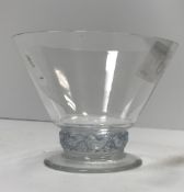 A Lalique conical glass with relief work and blue tinted bird decorated band on a spreading foot 7.