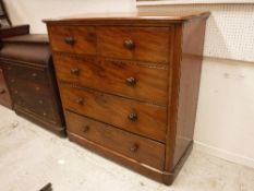 A Victorian mahogany chest of two short over three long graduated drawers,