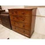 A Victorian mahogany chest of two short over three long graduated drawers,