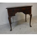 A walnut lowboy in the early 18th Century manner,