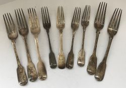 A collection of five 19th Century silver table forks and four similar dessert forks,