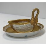 A Potschappel Dresden cabinet cup as a swan in blanc de chine with gilded decoration 8.