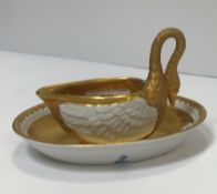 A Potschappel Dresden cabinet cup as a swan in blanc de chine with gilded decoration 8.