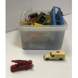 A box containing a collection of Lesney die-cast vehicles including fire engine, Ruston digger,