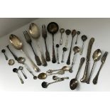 A collection of silver and other cutlery to include tablespoons, sauce ladle, various teaspoons,