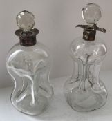 Two blown glass waisted "Glug Glug" decanters with silver rims and glass stoppers