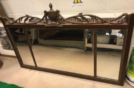 A 20th Century mahogany and gold painted framed triple plate mantel mirror with scrolling foliate