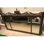 A 20th Century mahogany and gold painted framed triple plate mantel mirror with scrolling foliate