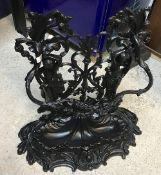 A Victorian style cast iron black painted stick stand,